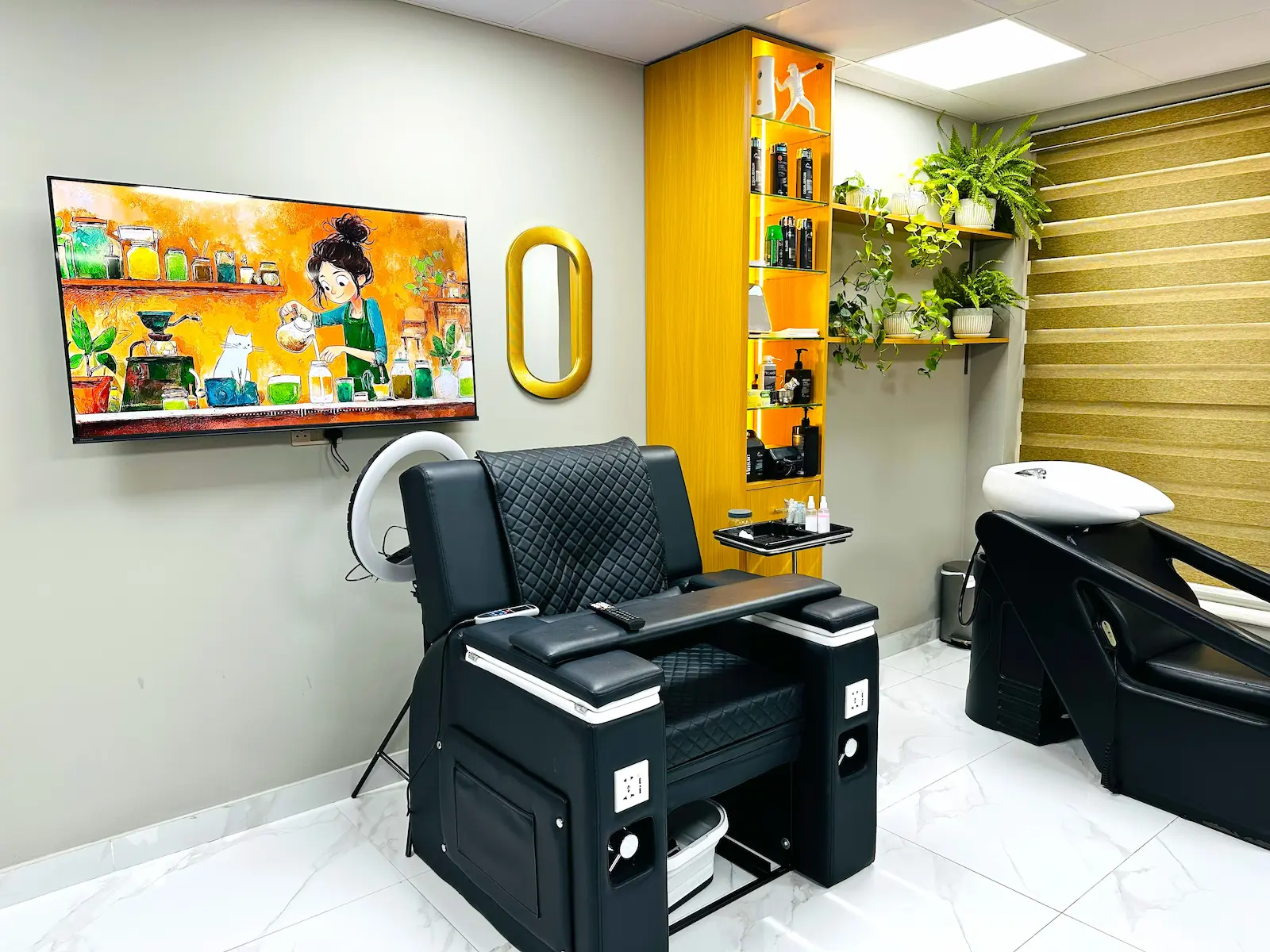 barbershop chair and hair washing massage station interior at Kings Afro Barbershop in JVC Dubai