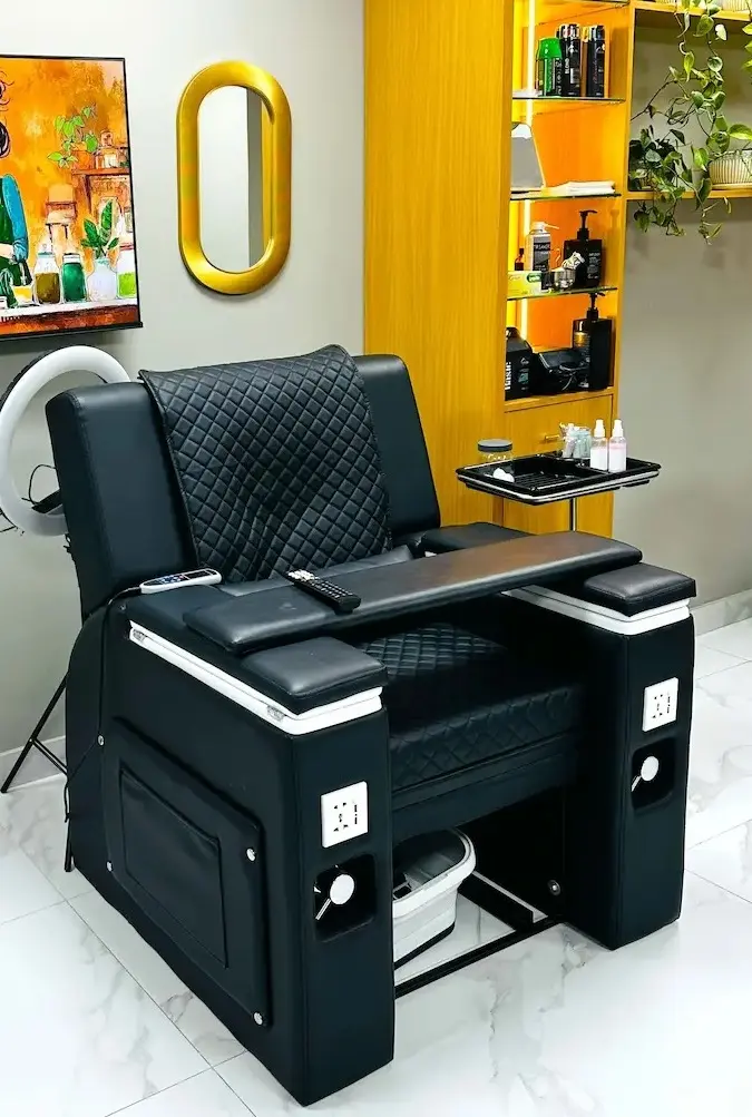 premium massage chair for relaxing head and neck massage at Kings Afro Barbershop in JVC Dubai