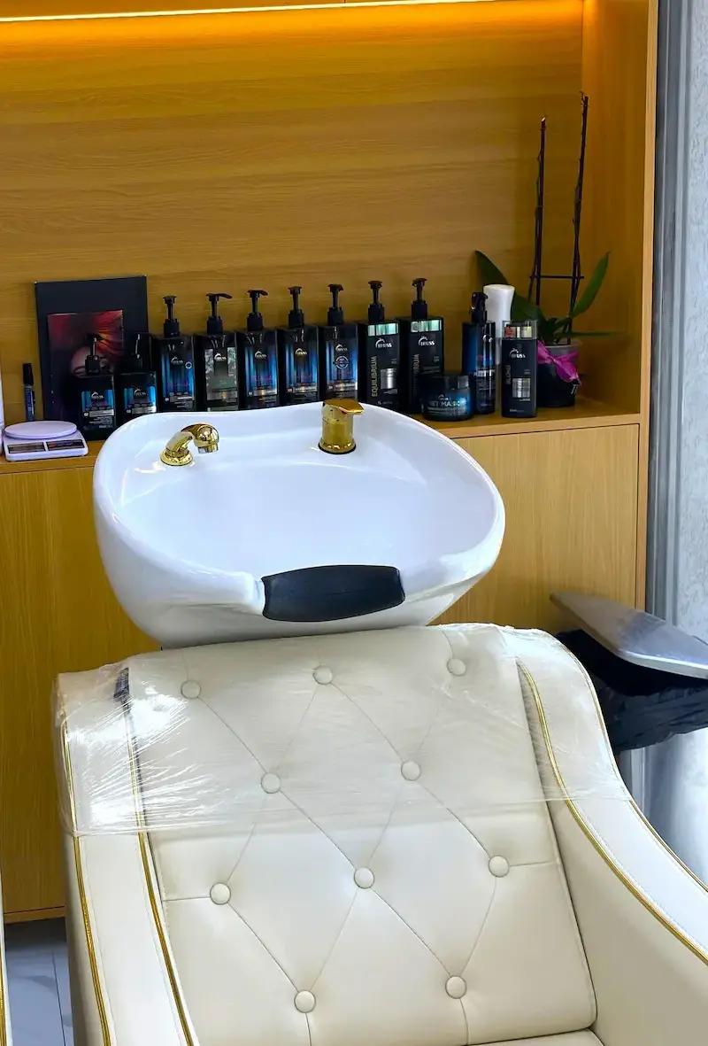 professional barber shampoo station for hair washing at Kings Afro Barbershop in JVC Dubai